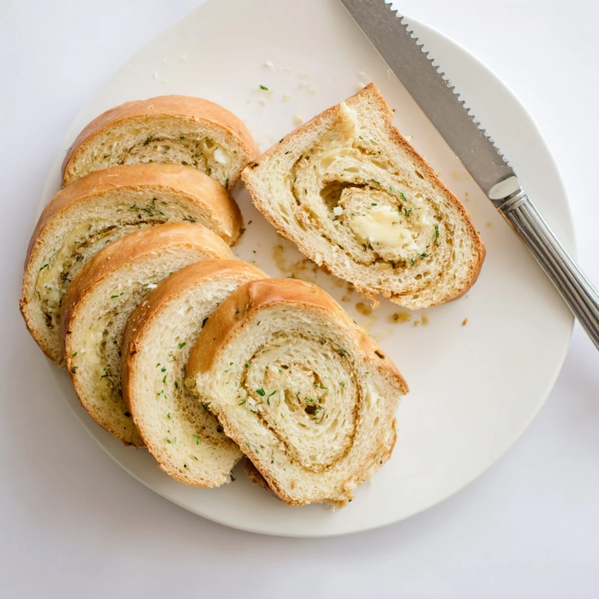 Golden garlic and herb bread loaf fresh from the oven with a golden brown crust