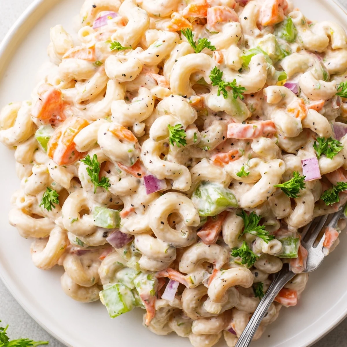 Classic Macaroni Salad ready for potlucks, creamy texture with crunchy celery