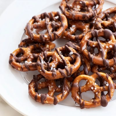 Salty pretzels baked in sweet butter toffee and topped with melted chocolate chips.